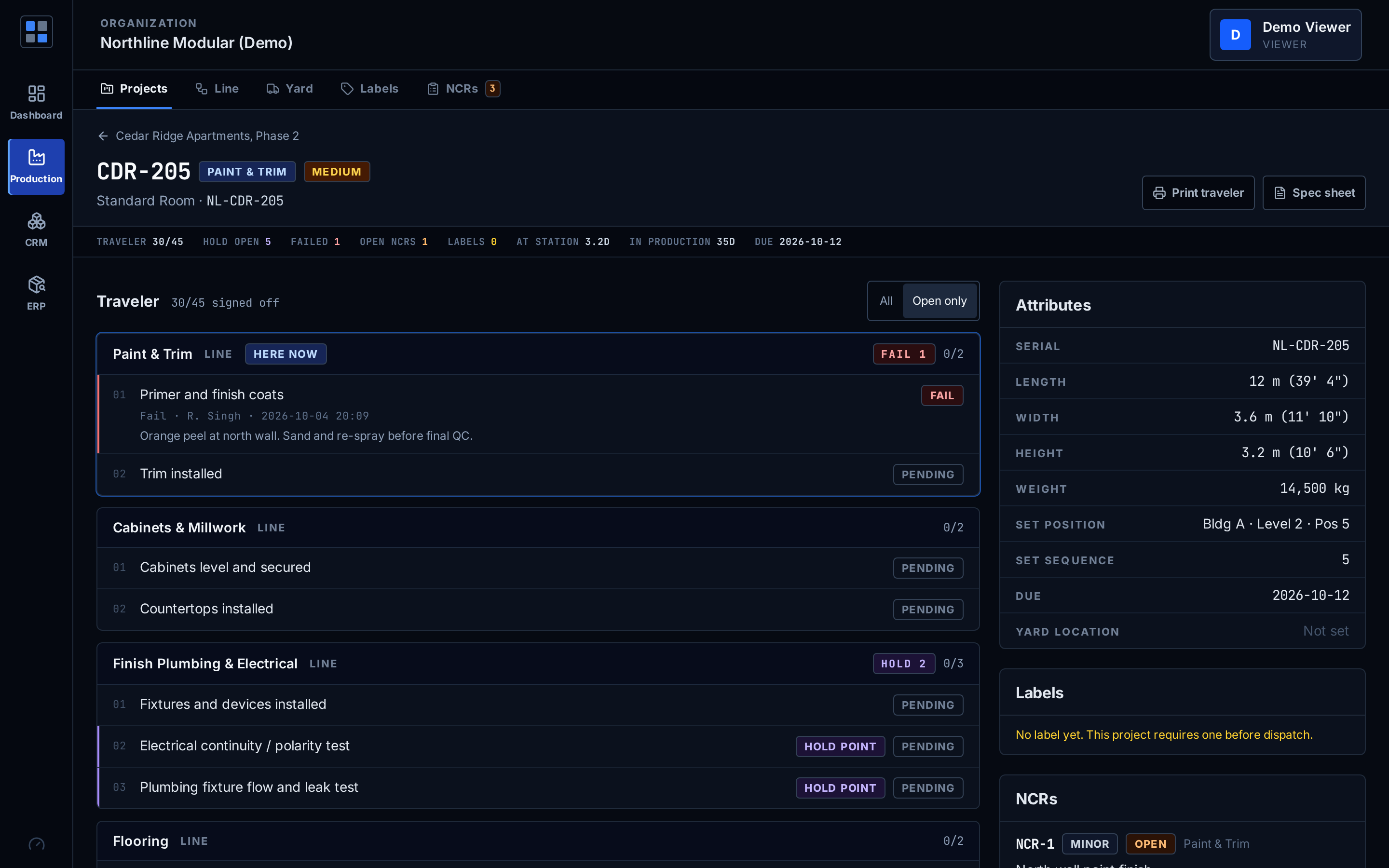 Module page with a failed traveler check, hold points, attributes and an open NCR
